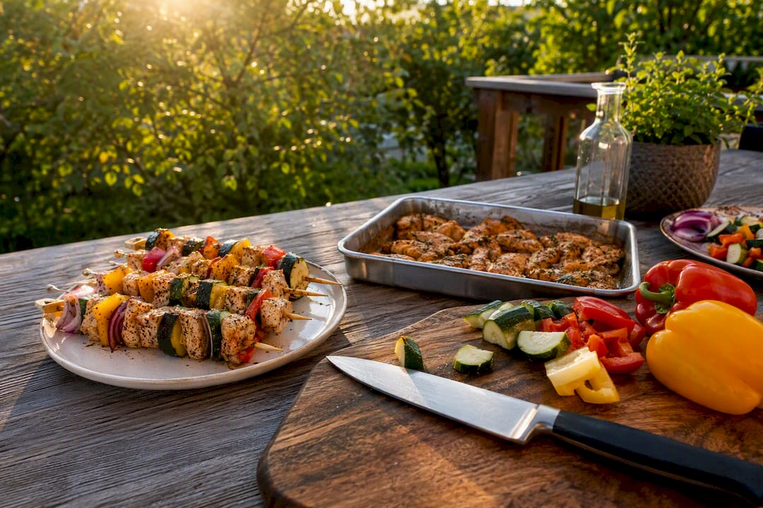 Sheet pan meal preparation with vegetables and chicken