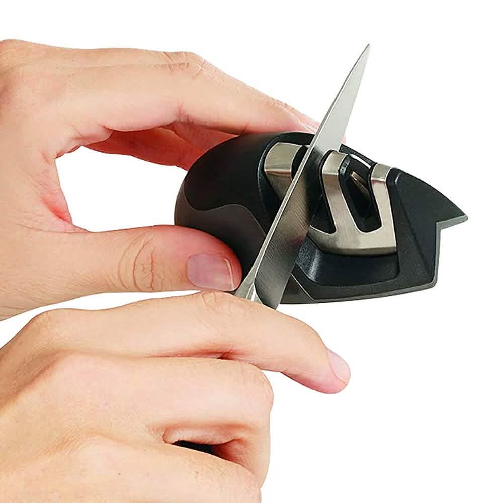 Knife Sharpener and Onion Holder for Slicing, 2-Piece Set, sharpener in use - Wine Drop Cookery LLC