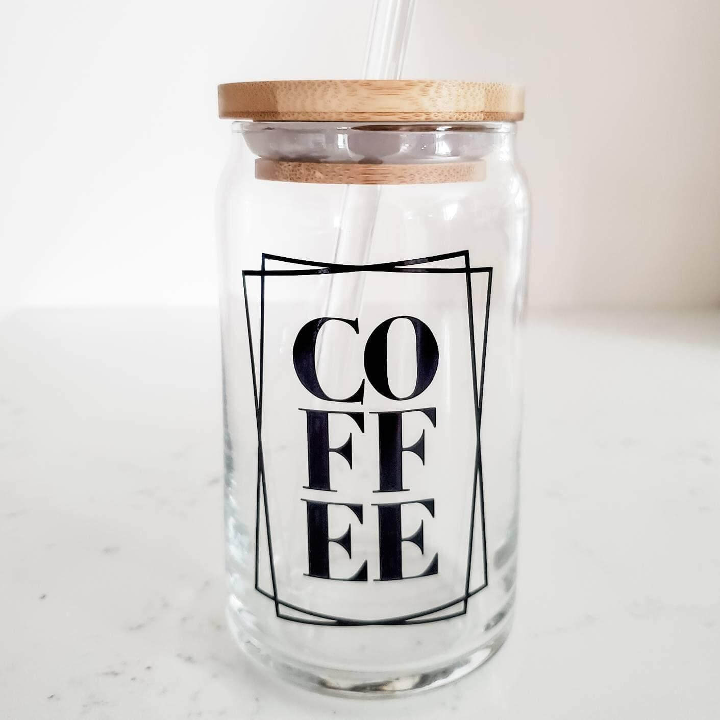 Stylish glass can cup for coffee lovers with bamboo lid and straw, featuring 'COFFEE' in bold serif font.