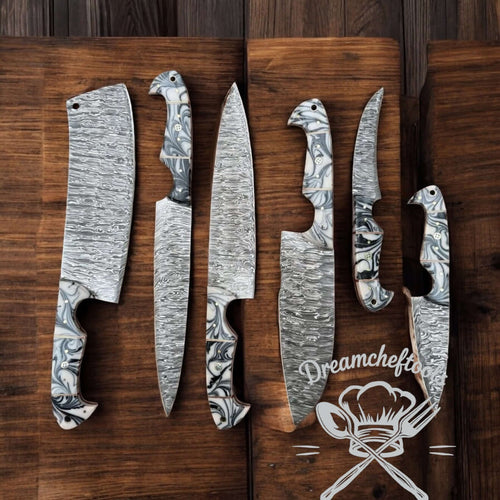 An 8 inch Damascus chef knife with an epoxy resin handle and leather sheath