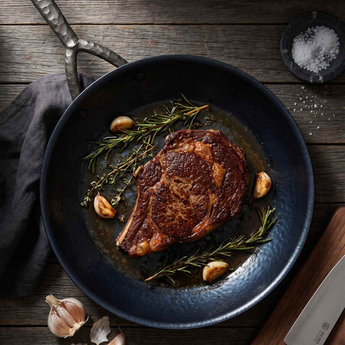 Artist hammered carbon steel frying pan