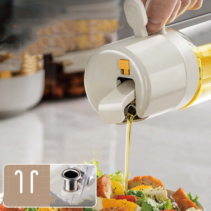 2 In 1 Oil Sprayer Bottle BBQ Cooking for cooking dispensing oil on a fresh salad with a convenient automatic opening design
