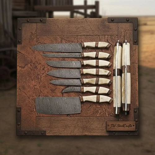 7-piece Damascus kitchen knife set displayed on a wooden board, featuring various knife types with bone handles.
