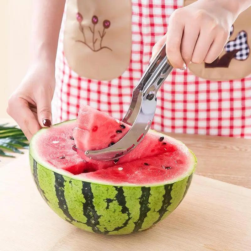 Stainless Steel Watermelon Slicer or Melon Baller, slicer in use on a watermelon half - Wine Drop Cookery LLC