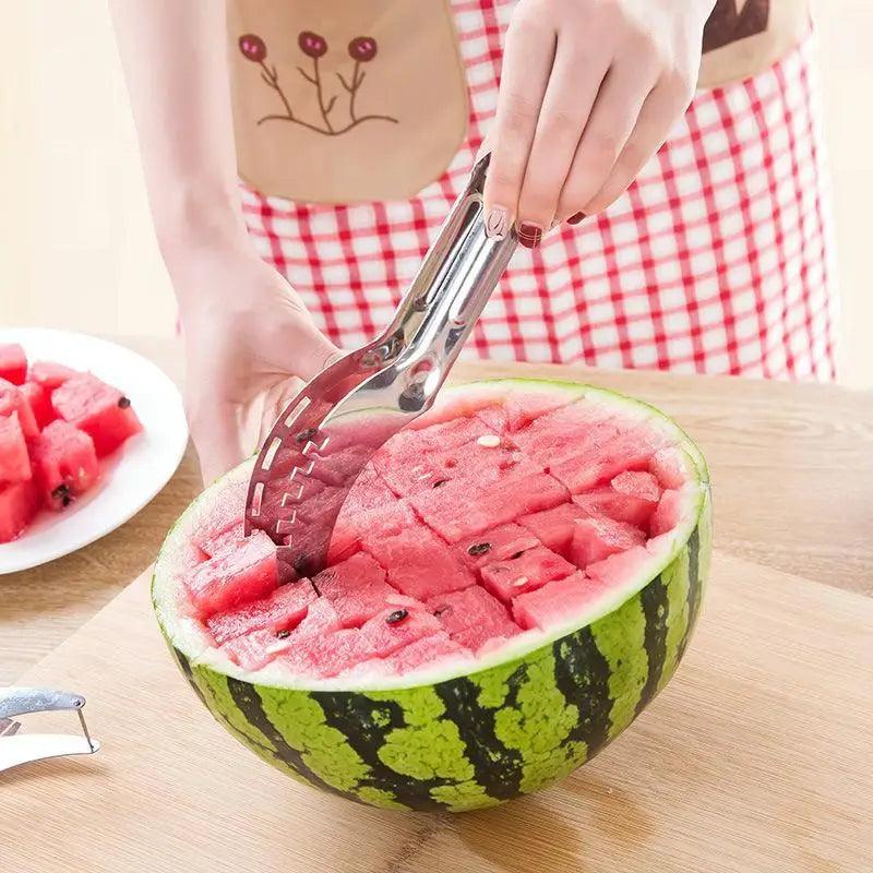 Stainless Steel Watermelon Slicer or Melon Baller, lifting cubes from a watermelon - Wine Drop Cookery LLC