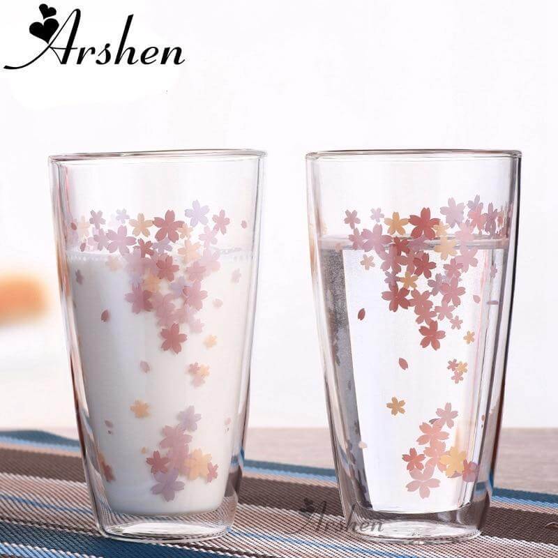 Sakura glass tea cup set featuring delicate cherry blossom designs, ideal for enjoying beverages elegantly.