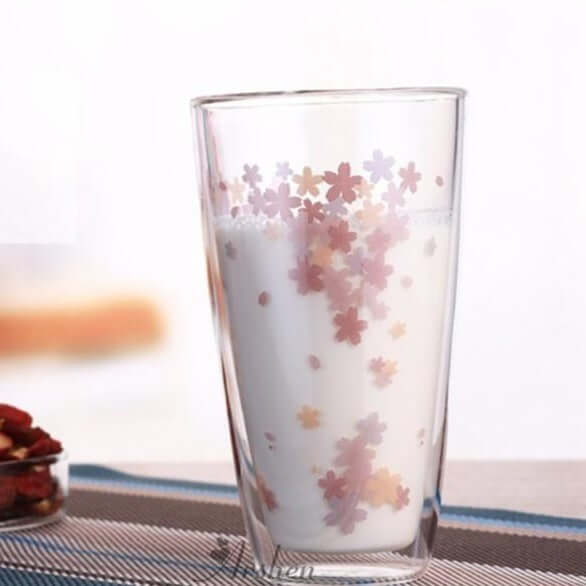 Sakura glass tea cup set featuring delicate cherry blossom design, perfect for enjoying beverages elegantly.